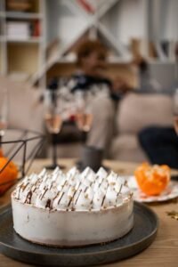 A delectable meringue cake on a cozy table setting, perfect for special occasions.